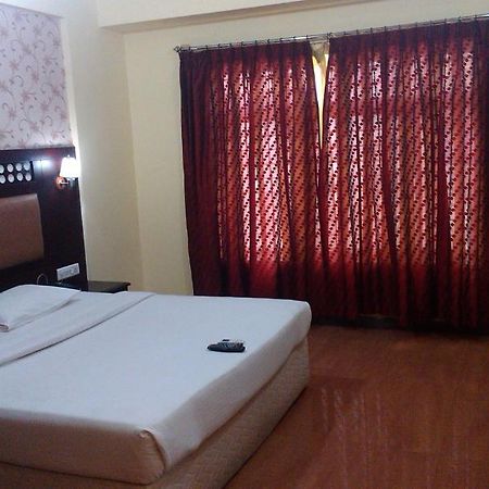 Solitaire Suites Bangalore Habitación foto